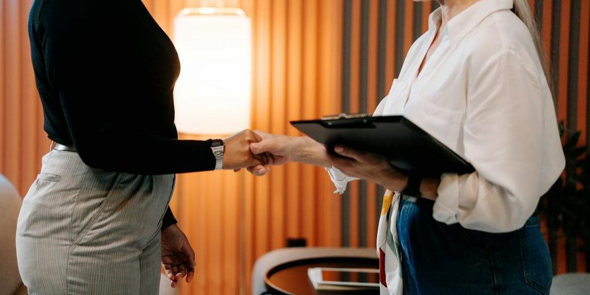 Woman in Black Long Sleeve Shirt Had a Job Interview
